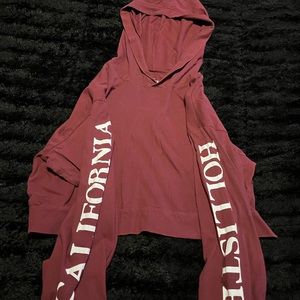 Hollister red crop top. Fabric is soft and the sleeves are a bit long.